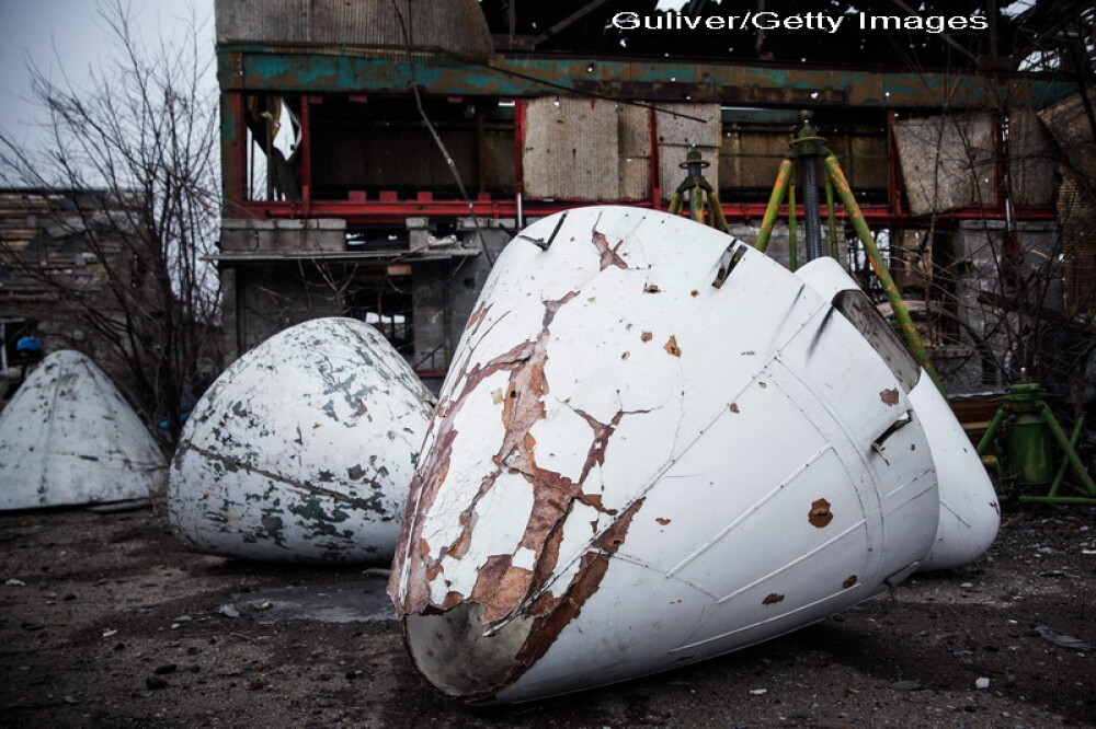 Apocalipsa din estul Ucrainei. Peisajul dezolant din Donetk aduce aminte de sfarsitul celui de-Al Doilea Razboi Mondial. FOTO - Imaginea 10