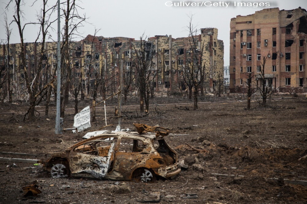 Apocalipsa din estul Ucrainei. Peisajul dezolant din Donetk aduce aminte de sfarsitul celui de-Al Doilea Razboi Mondial. FOTO - Imaginea 12
