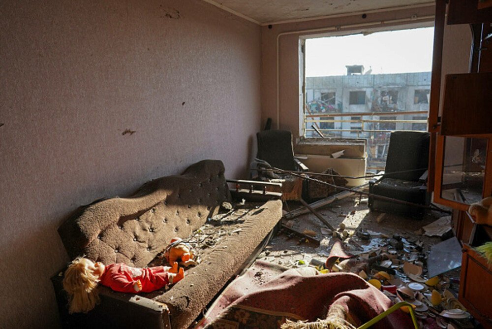 Imaginile dureroase provocate de război. Cadavre calcinate şi clădiri distruse în estul Ucrainei - Imaginea 4