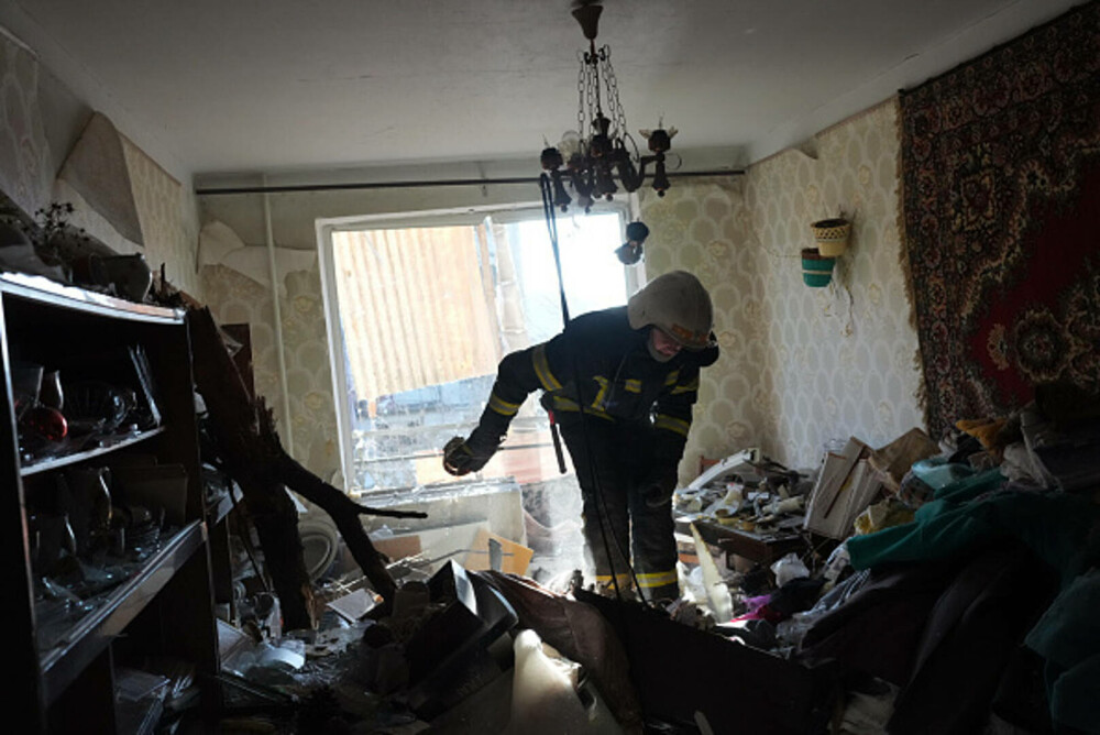 Imaginile dureroase provocate de război. Cadavre calcinate şi clădiri distruse în estul Ucrainei - Imaginea 5