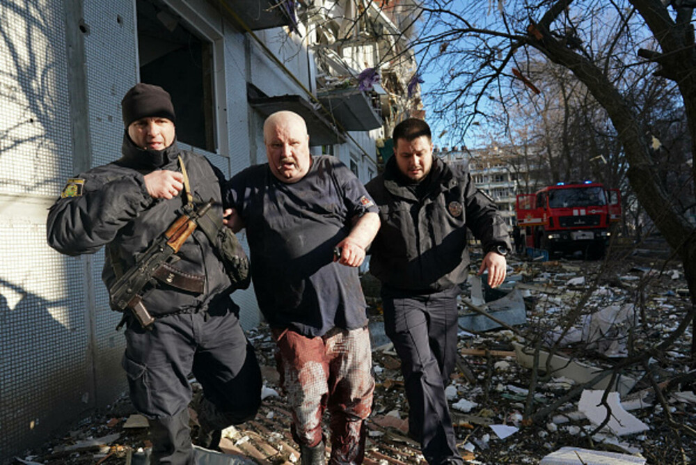 Imaginile dureroase provocate de război. Cadavre calcinate şi clădiri distruse în estul Ucrainei - Imaginea 6