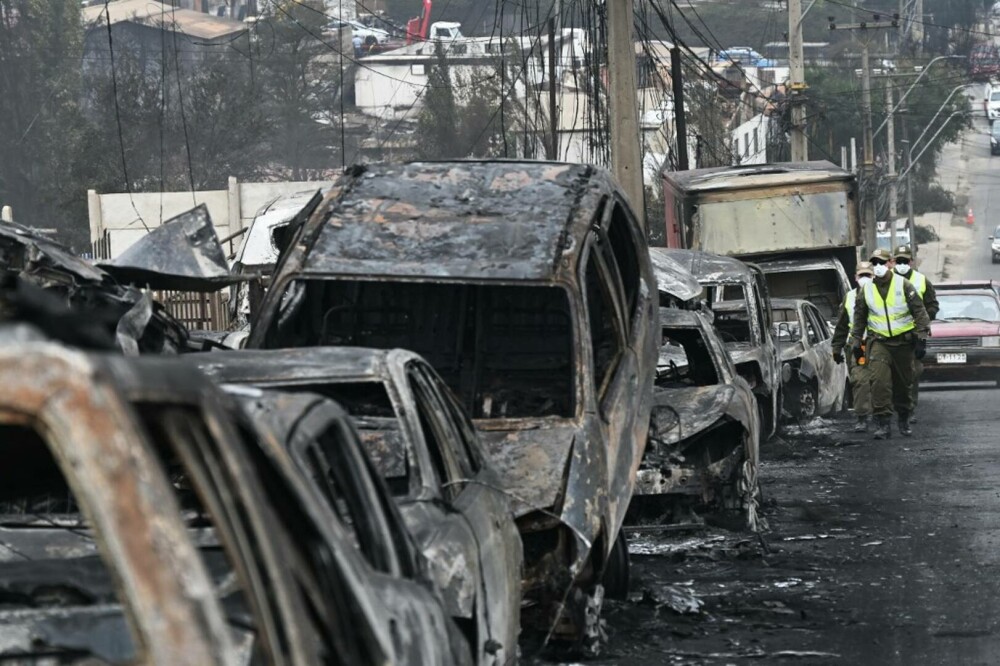 FOTO. Dezastru în Chile. ”Cea mai mare tragedie, din 2010”. Cel puţin 64 de oameni au murit în incendiile forestiere - Imaginea 2