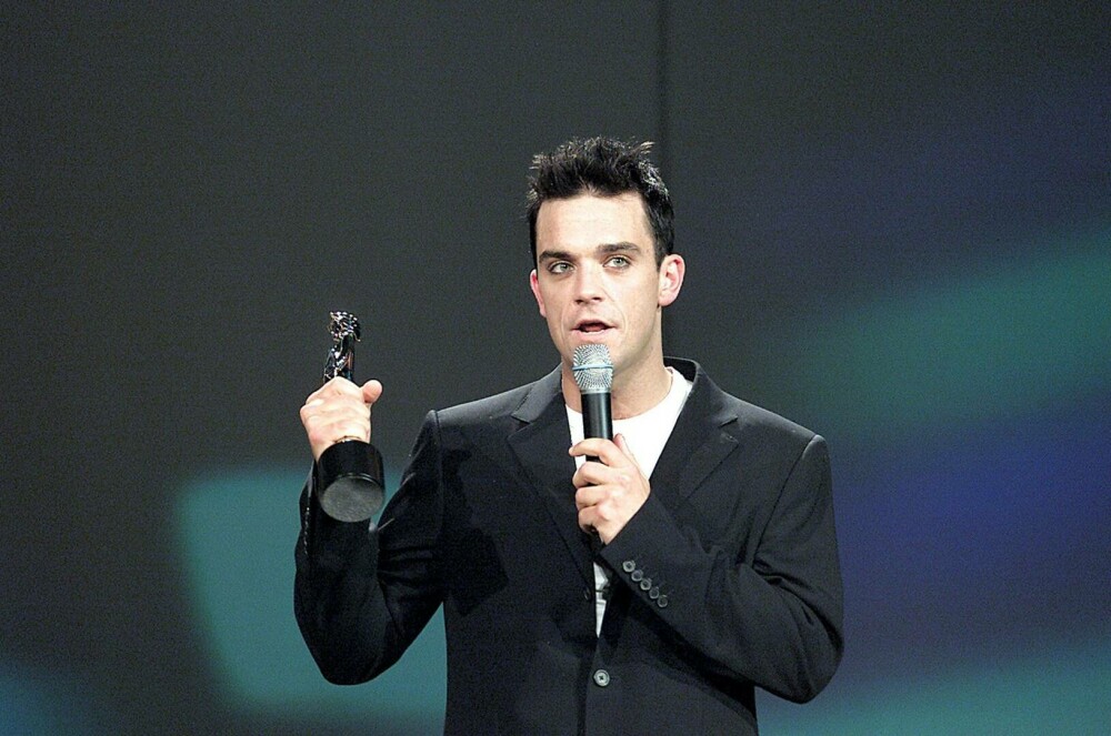 Momente nebunești cu Robbie Williams, în 30 de ani de carieră. Starul rock aniversează 50 de ani | FOTO - Imaginea 1