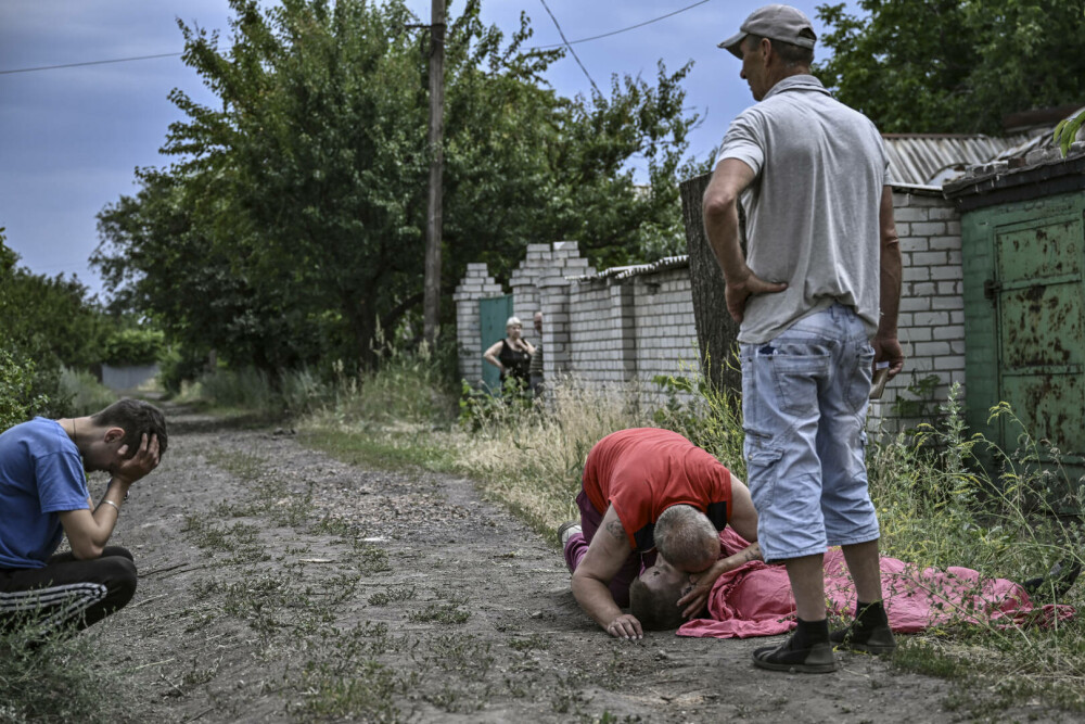 Războiul ruso-ucrainean, în imagini. Doi ani de la invazia pe scară largă a trupelor lui Putin în Ucraina | GALERIE FOTO - Imaginea 9