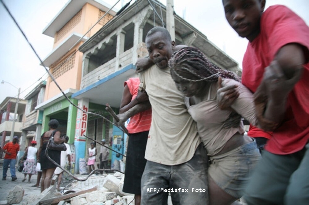 Apocalipsa din Haiti, in imagini. Peste 100.000 de morti, anunta premierul - Imaginea 1
