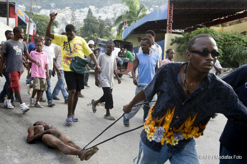 Spanzurat si ars in mijlocul strazii! Razbunare animalica in Haiti - Imaginea 4