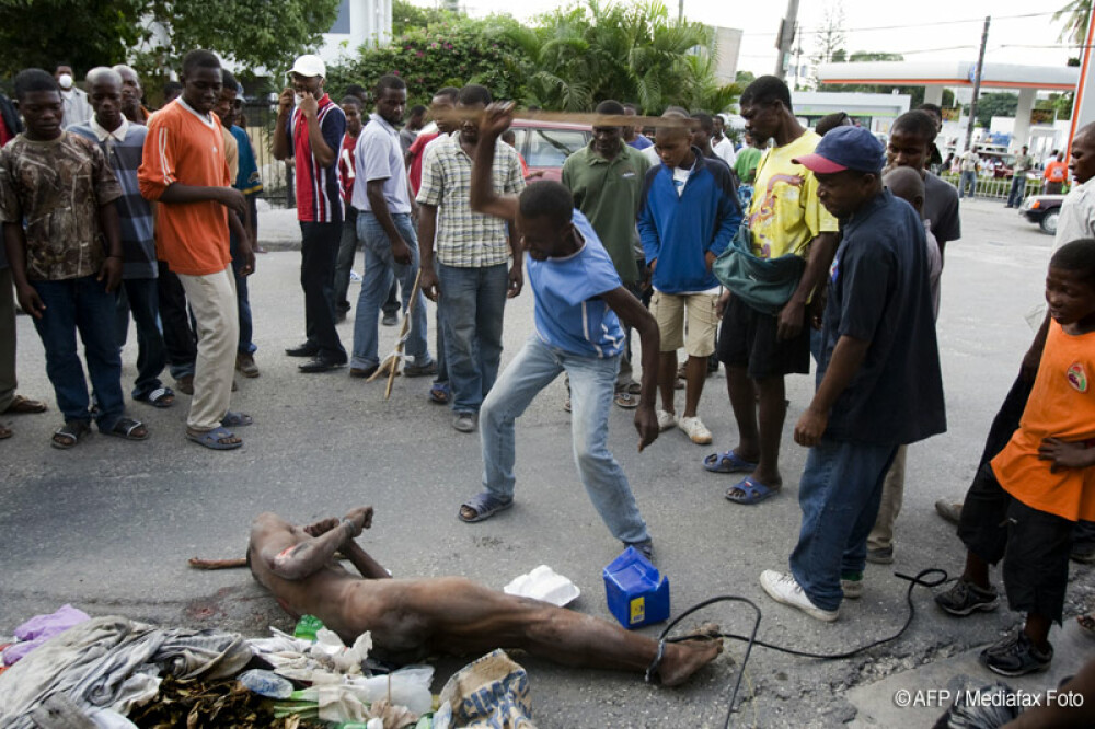 Spanzurat si ars in mijlocul strazii! Razbunare animalica in Haiti - Imaginea 2