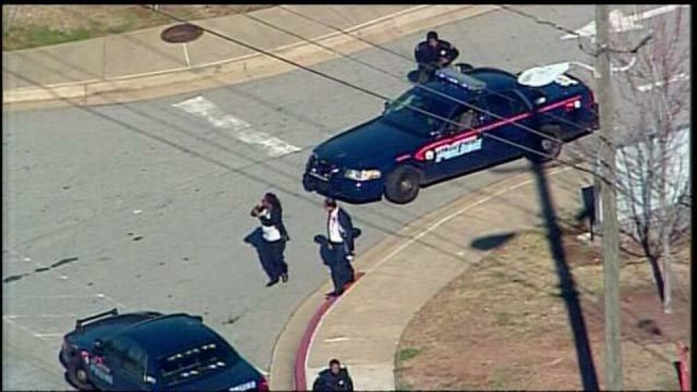 Focuri de arma intr-o scoala din Atlanta. Un elev de 14 ani, impuscat in ceafa; Un suspect, retinut - Imaginea 3