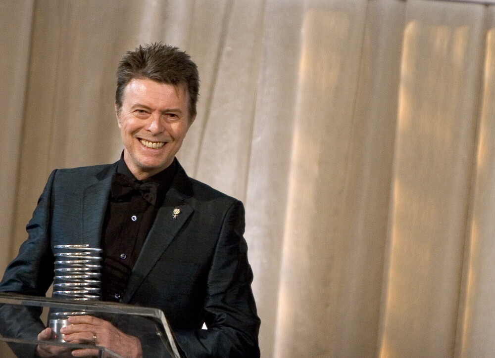 David Bowie a murit la 69 de ani, dupa o lupta de 18 luni cu cancerul. Ultima fotografie cu artistul in viata - Imaginea 9
