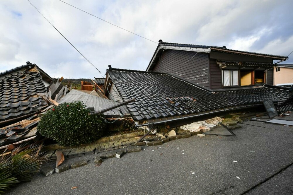 Cutremur în Japonia. Sute de case au fost distruse de seism ori mistuite de foc, în incendiile care au izbucnit - Imaginea 1