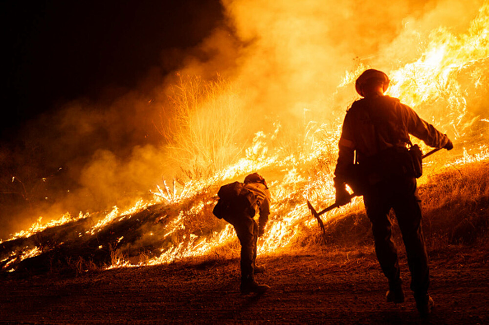 Incendiile din Los Angeles, complet sub control după trei săptămâni. Pagubele sunt estimate la sute de miliarde de dolari - Imaginea 7