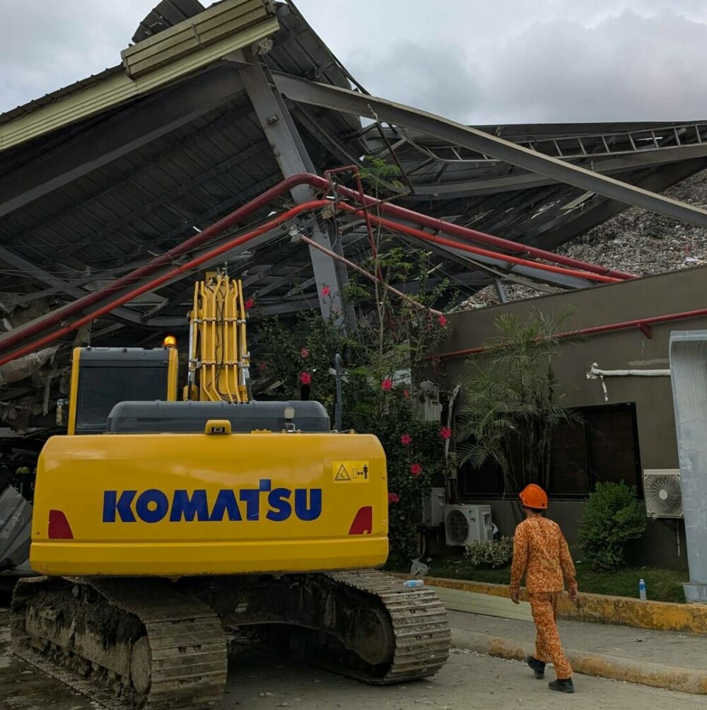 Un „munte” de gunoaie s-a prăbușit într-un oraș din Filipine, 100 de oameni au fost îngropați de vii | FOTO & VIDEO - Imaginea 23