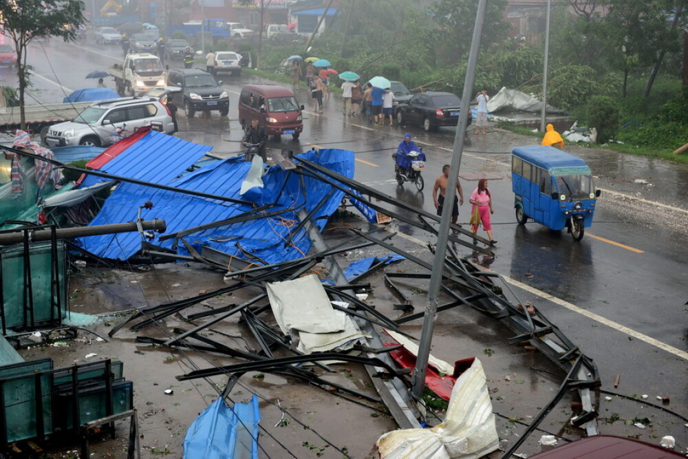 Cum arata capitala Chinei dupa cele mai GRAVE inundatii din ultimii 61 de ani. GALERIE FOTO - Imaginea 1