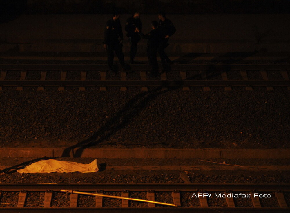 Tragedia din Spania, in imagini. Galerie FOTO de la locul unde un tren de mare viteza a deraiat - Imaginea 12