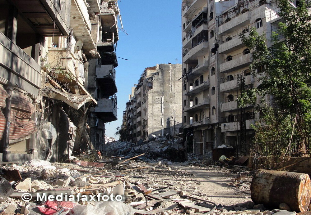 Dimensiunea distrugerilor din al treilea oras sirian ca marime: imagini apocaliptice din Homs - Imaginea 4