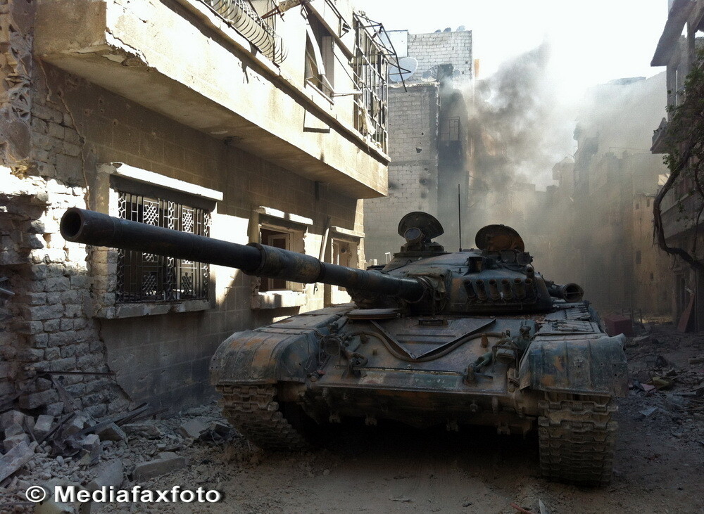 Dimensiunea distrugerilor din al treilea oras sirian ca marime: imagini apocaliptice din Homs - Imaginea 3