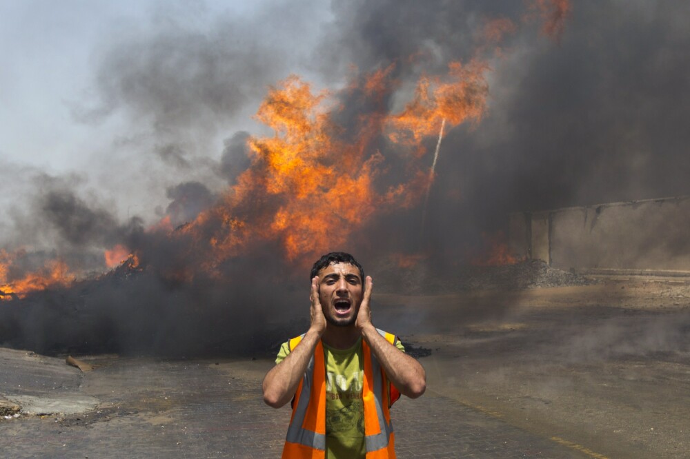 Civili folositi ca scuturi umane si atacuri de pedeapsa asupra palestinienilor. Imagini violente ale conflictului Israel-Gaza - Imaginea 6