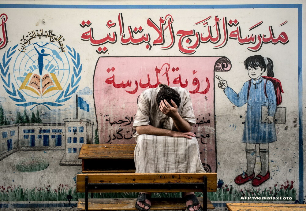 O zi in iadul din Fasia Gaza. Musulmanii ingroziti, civili nevinovati, se ascund in biserici ca sa scape de moarte. FOTO - Imaginea 6
