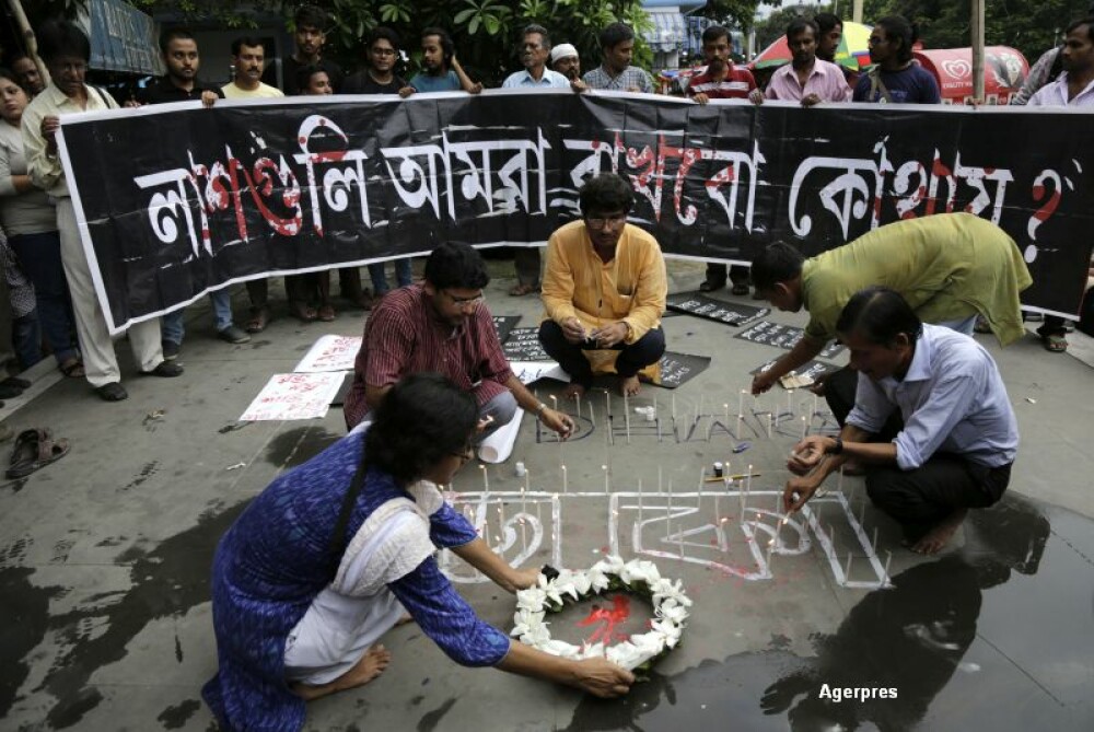 Bilantul atacului din Bangladesh: 20 de morti, zeci de raniti. Primele imagini cu teroristii si detaliul bizar din ele - Imaginea 11
