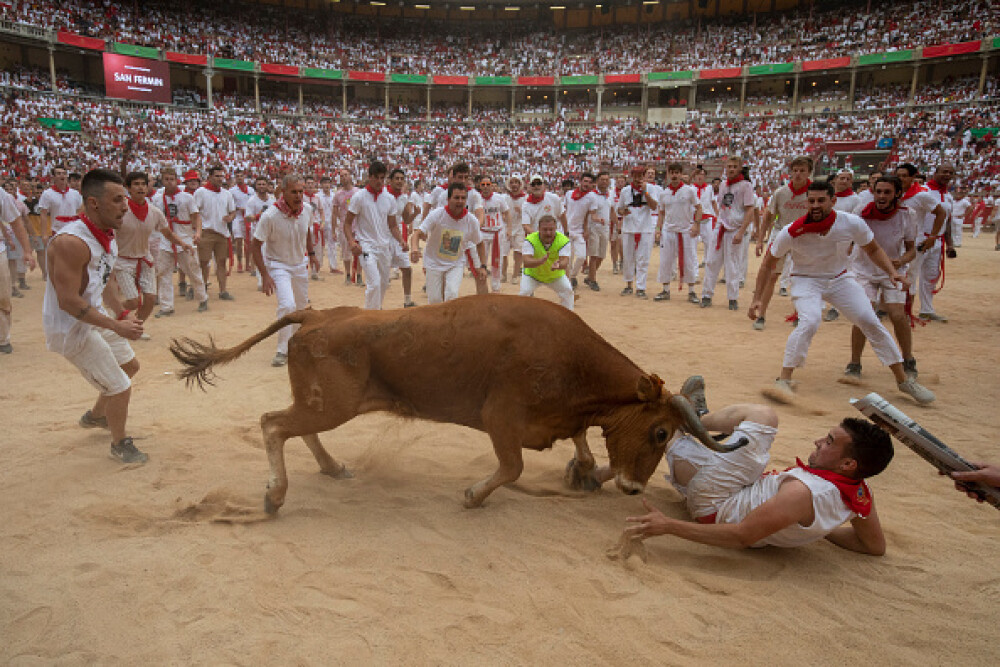 Imagini șocante. Turiști călcați în picioare și împunși de tauri la Pamplona - Imaginea 22