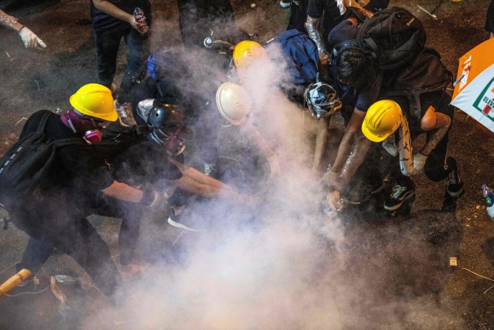 Incidente în Hong Kong. Poliţia a folosit gaze lacrimogene împotriva manifestanților - Imaginea 4
