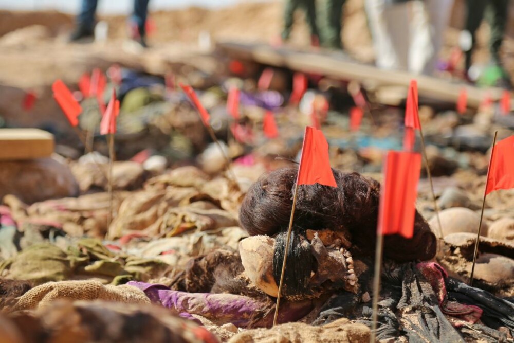 Cadavre de bebeluși descoperite într-o groapă comună cu rămășițele victimelor lui Saddam - Imaginea 1