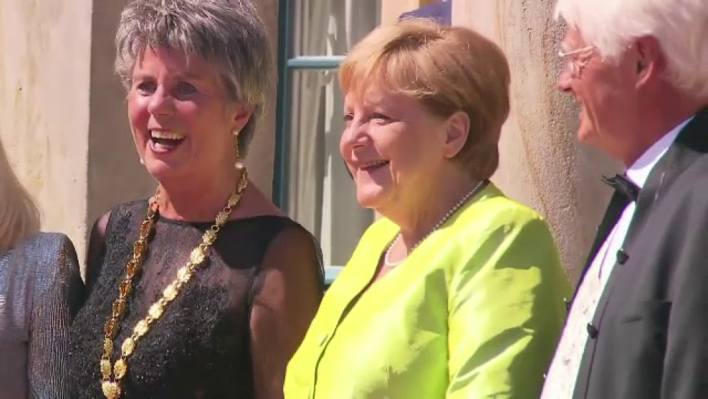Apariție surprinzătoare a Angelei Merkel la un eveniment, după crizele de tremurat - Imaginea 1