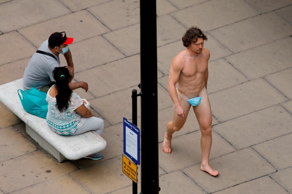 GALERIE FOTO. Cum a apărut un bărbat pe una din cele mai aglomerate străzi din Londra - Imaginea 1