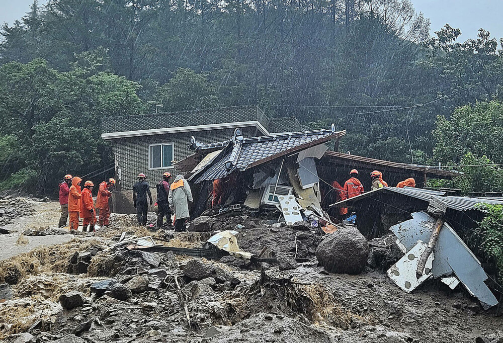 Bilanțul victimelor alunecărilor de teren din Coreea de Sud este în creștere | FOTO - Imaginea 8