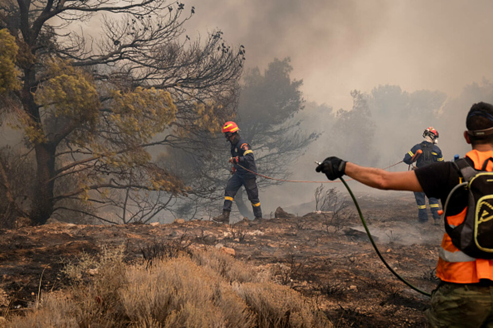 Incendii devastatoare în Rodos. Mii de persoane au fost evacuate și au petrecut noaptea în aer liber | GALERIE FOTO - Imaginea 22