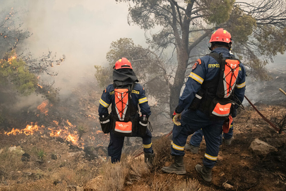 Incendii devastatoare în Rodos. Mii de persoane au fost evacuate și au petrecut noaptea în aer liber | GALERIE FOTO - Imaginea 21