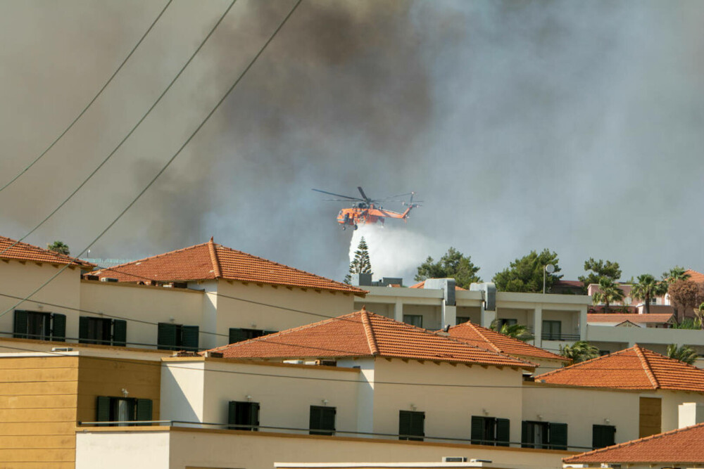 MAE, despre incendiile din Rodos: Numărul cetățenilor români aflați în zona de evacuare ar fi de aproximativ 25-30 - Imaginea 5