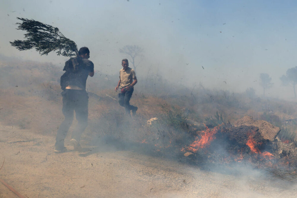 Incendii majore în Grecia. O turistă aflată pe o insulă povestește coșmarul trăit din cauza focului. „E ca un film de război” - Imaginea 7