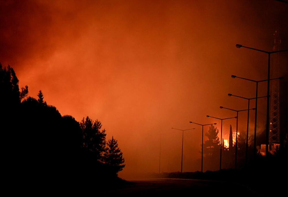 Turcia, împărțită între incendii de vegetaţie și ninsori. „E prima dacă când văd zăpadă în iulie”. GALERIE FOTO - Imaginea 7