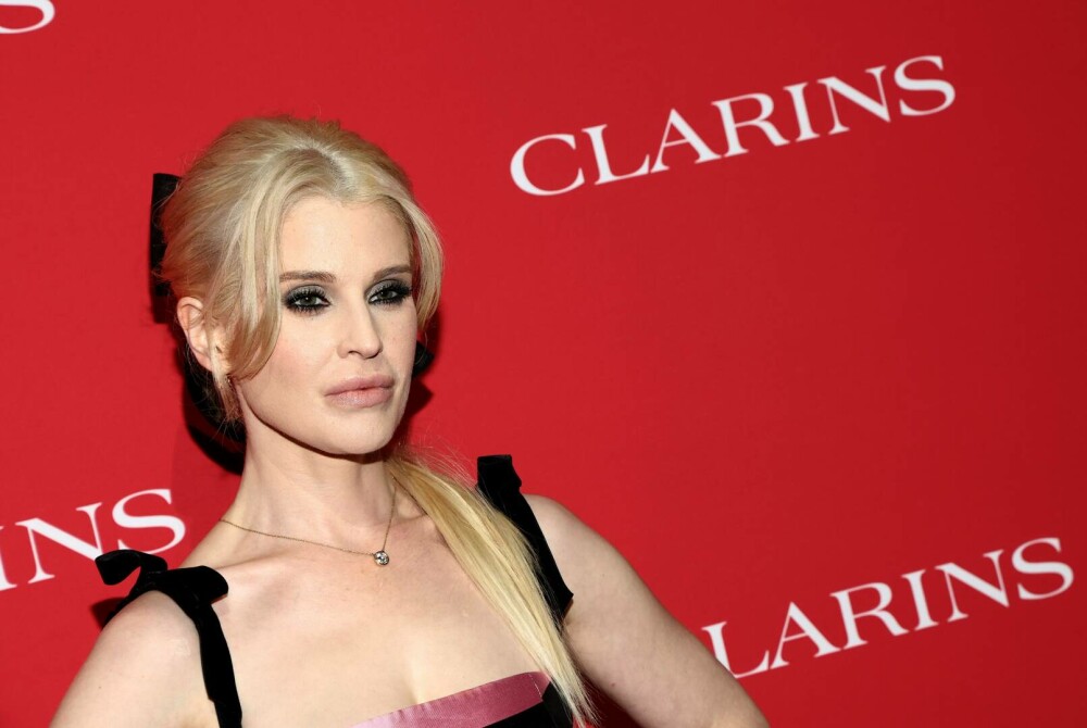 Kelly Osbourne a fost cerută în căsătorie în timpul ultimului concert susținut de tatăl său. Reacția lui Ozzy Osbourne - Imaginea 4