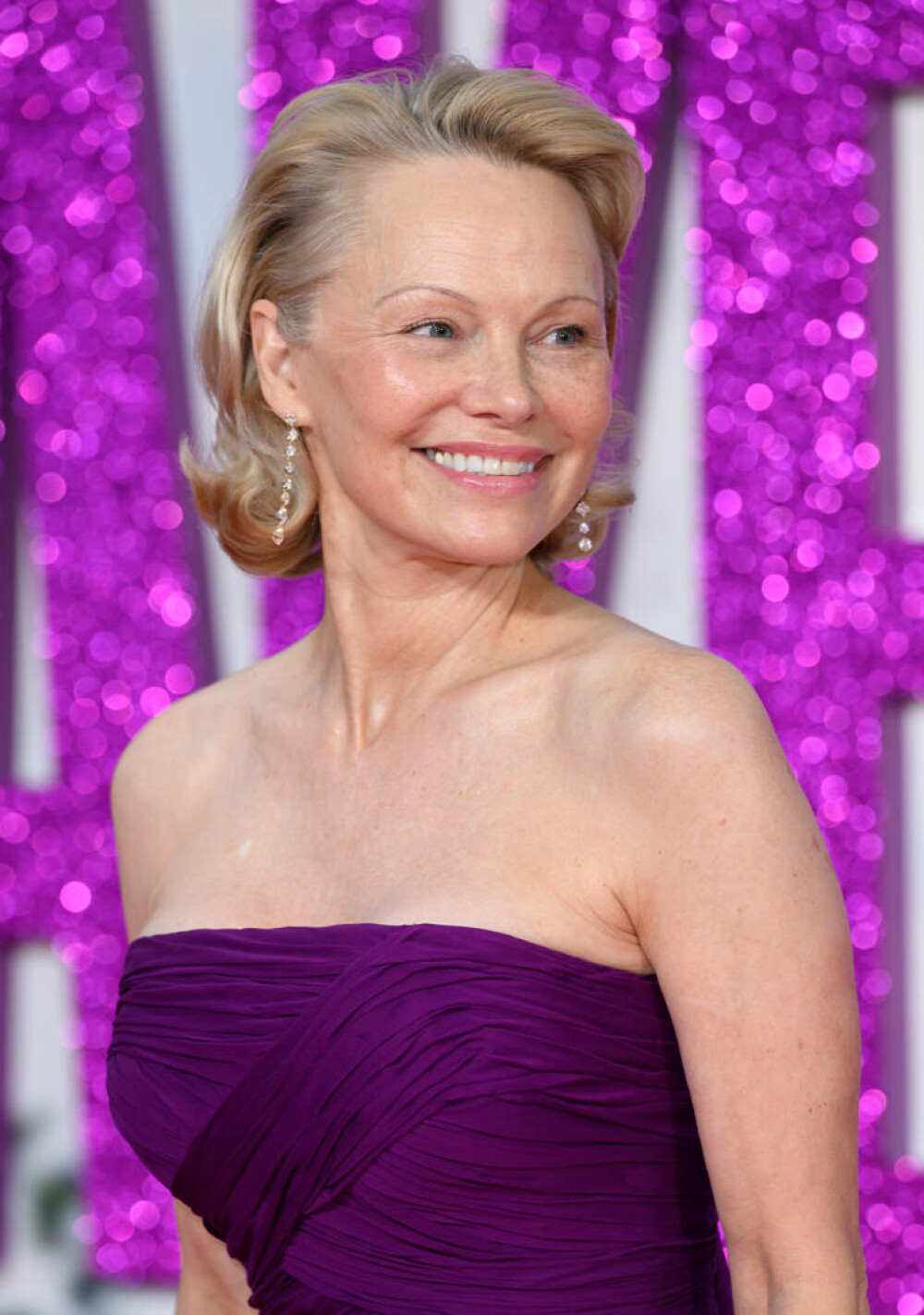 Pamela Anderson, gest neașteptat față de Liam Neeson, la premiera filmului „The Naked Gun”. GALERIE FOTO - Imaginea 4