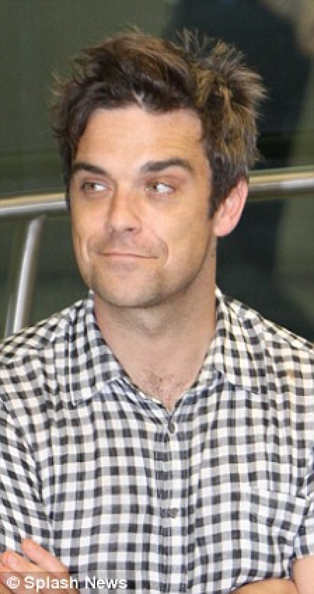 Robbie Williams si-a schimbat look-ul! - Imaginea 2