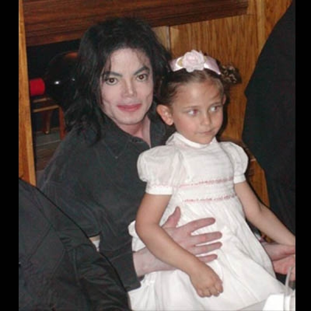Poze rare cu Michael Jackson si copiii lui! - Imaginea 8