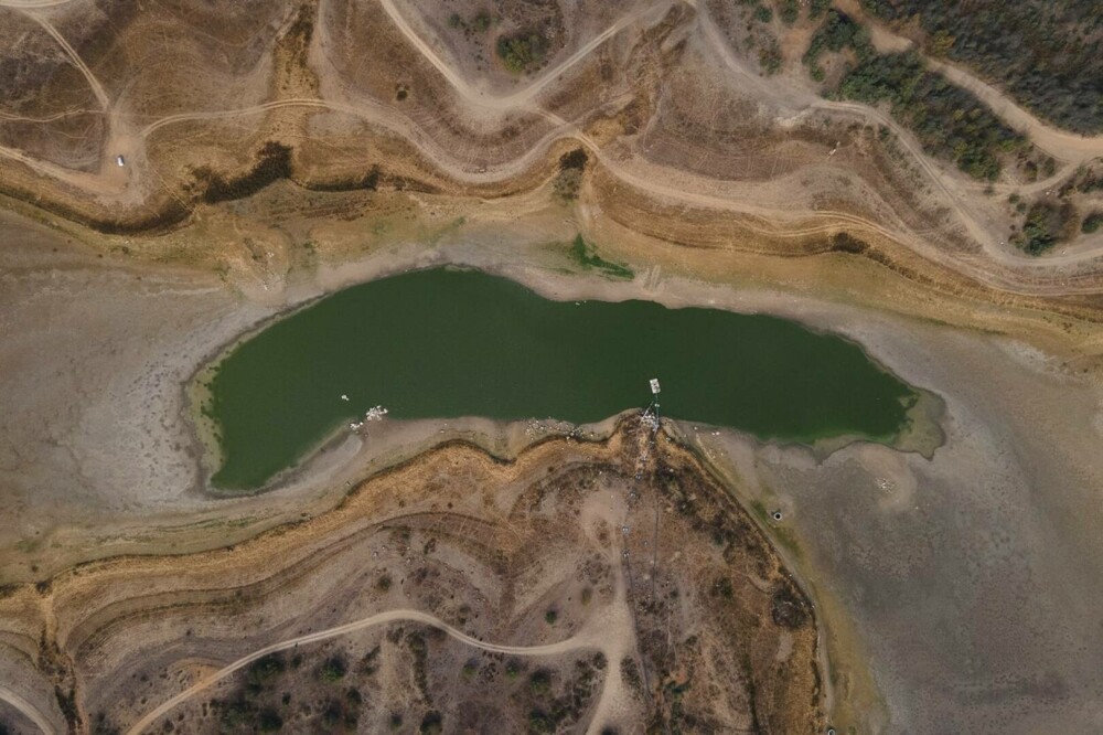 „Ne rugăm la Dumnezeu să ne dea apă”. Un lac din Chile s-a transformat într-un deșert. GALERIE FOTO - Imaginea 3