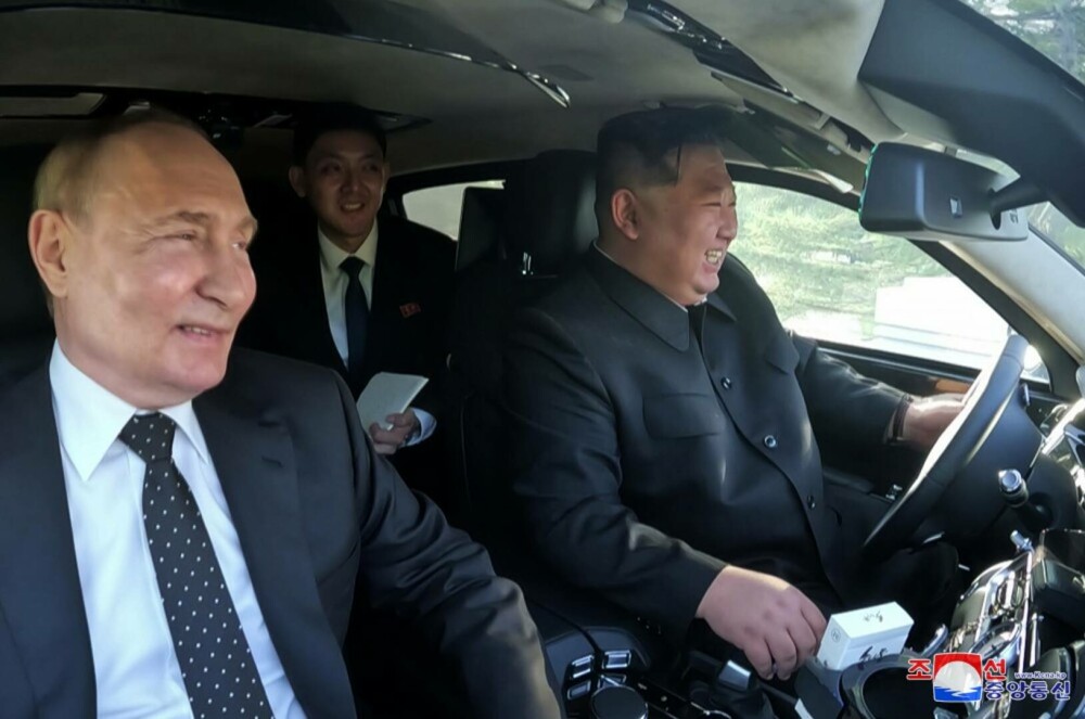 GALERIE FOTO. Imagini inedite cu Vladimir Putin și Kim Jong-Un. Cei doi dictatori, așa cum n-au mai fost văzuți niciodată - Imaginea 10