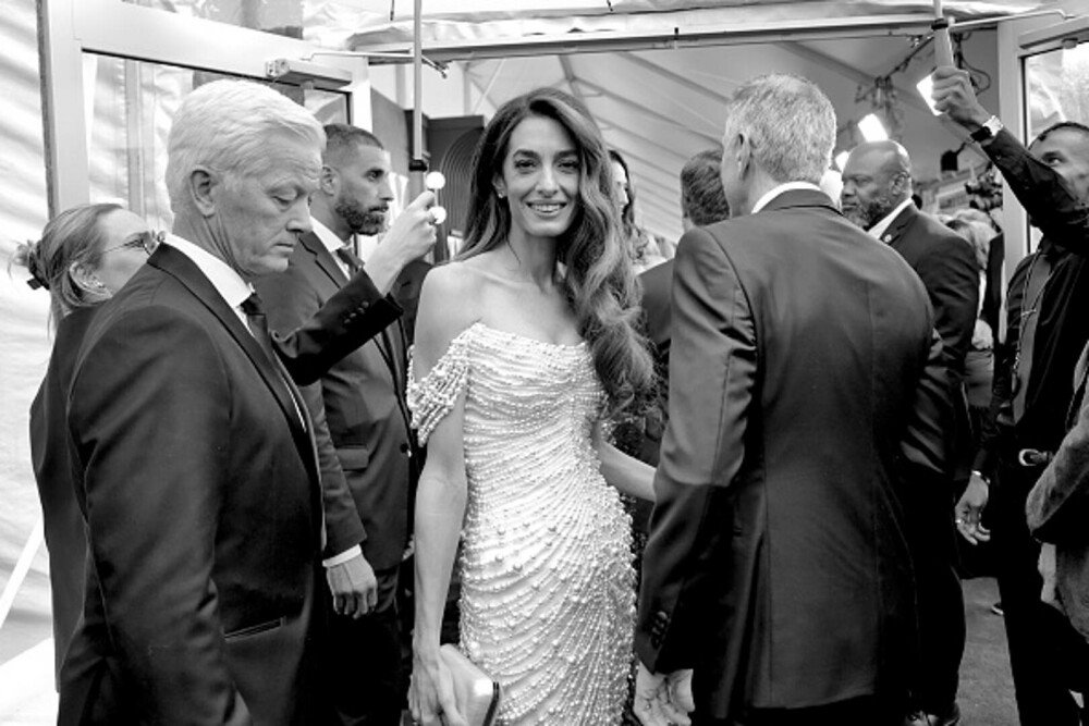 George Clooney și soția sa, apariție plină de eleganță pe covorul roșu. Gestul romantic pe care l-au făcut în fața camerelor - Imaginea 10