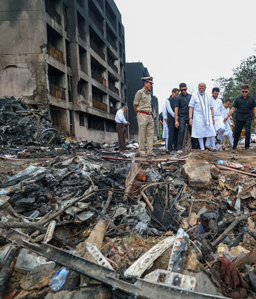 Prăbușirea avionului în India, cel mai grav dezastru aerian din lume din 2014. Continuă procesul de identificare a victimelor - Imaginea 7