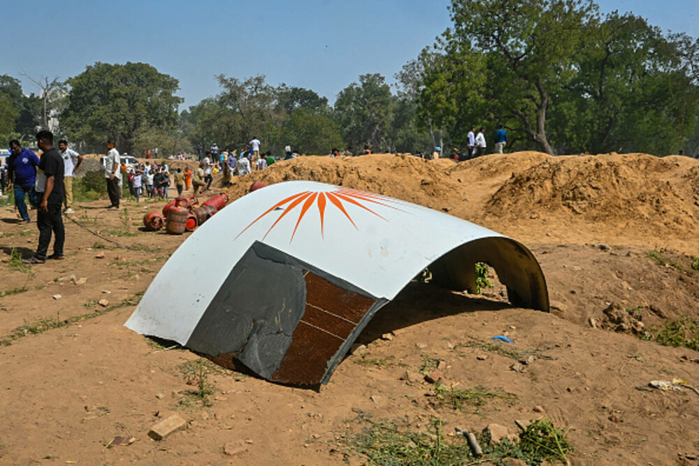Prăbușirea avionului în India, cel mai grav dezastru aerian din lume din 2014. Continuă procesul de identificare a victimelor - Imaginea 10