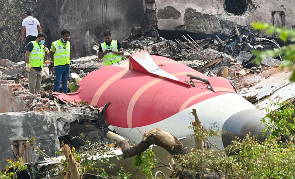Prăbușirea avionului în India, cel mai grav dezastru aerian din lume din 2014. Continuă procesul de identificare a victimelor - Imaginea 17