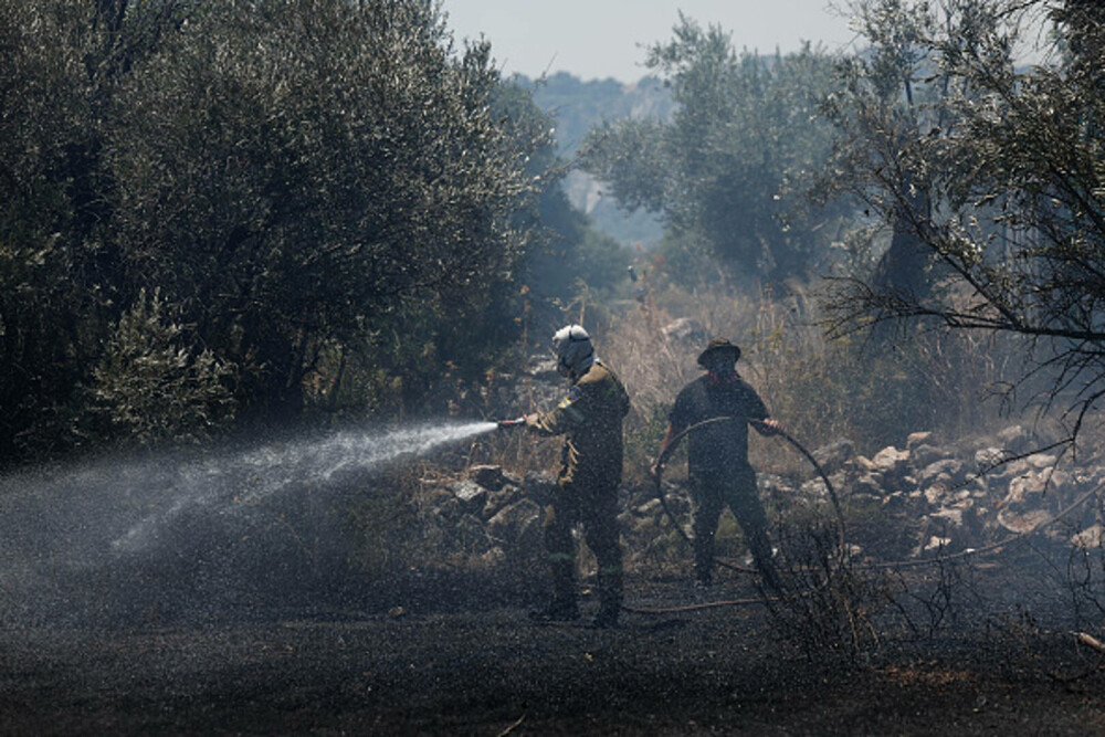 Incendii violente de vegetație devastează sudul Atenei. Riscul de izbucnire a noi focare rămâne ridicat. GALERIE FOTO - Imaginea 10
