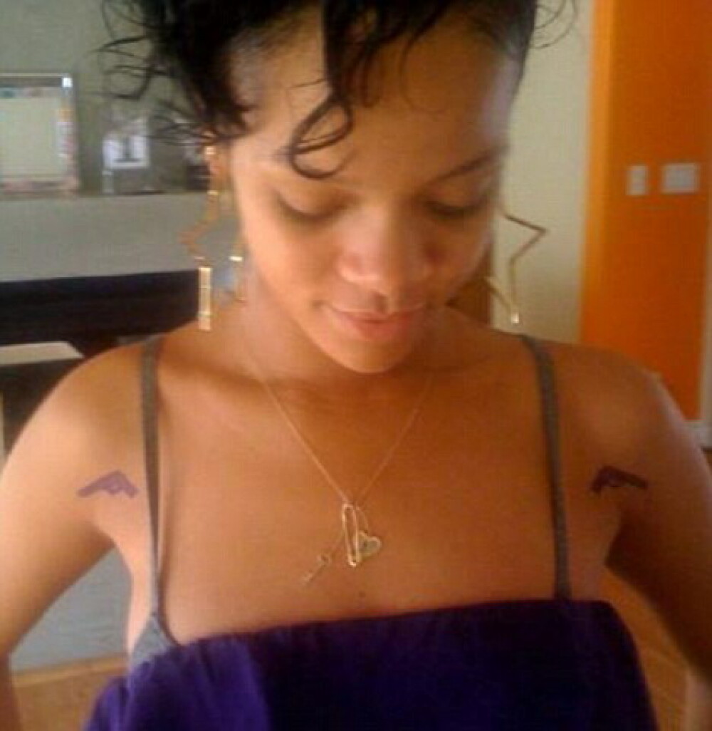 Rihanna s-a inarmat! - Imaginea 2
