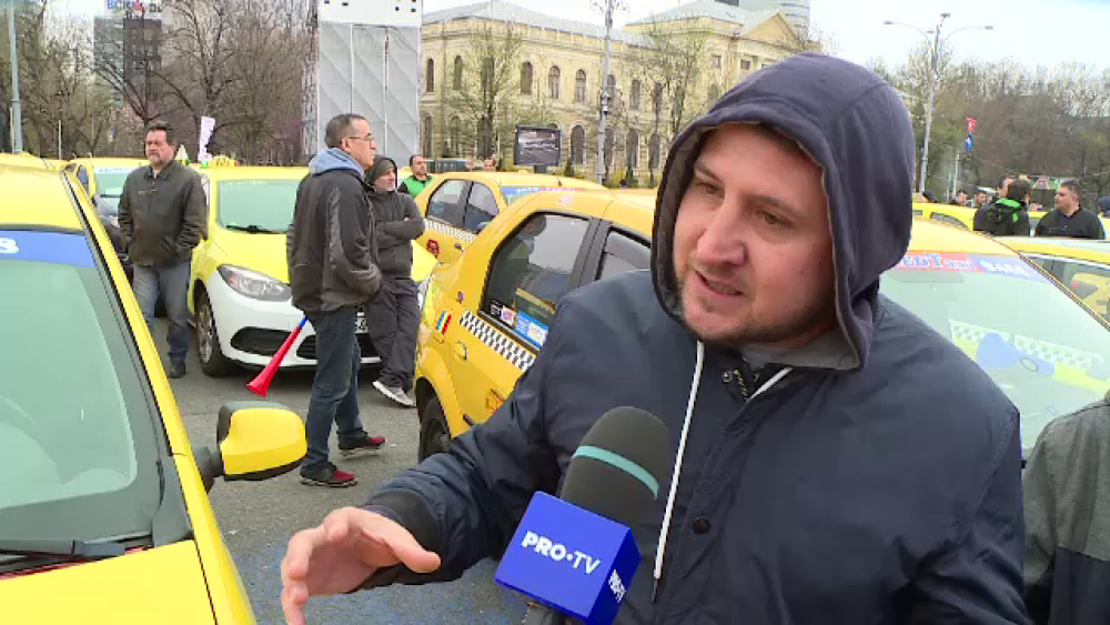 Reacția unui taximetrist surprins dormind la volan, în timpul protestului: „Să îi termine” - Imaginea 3