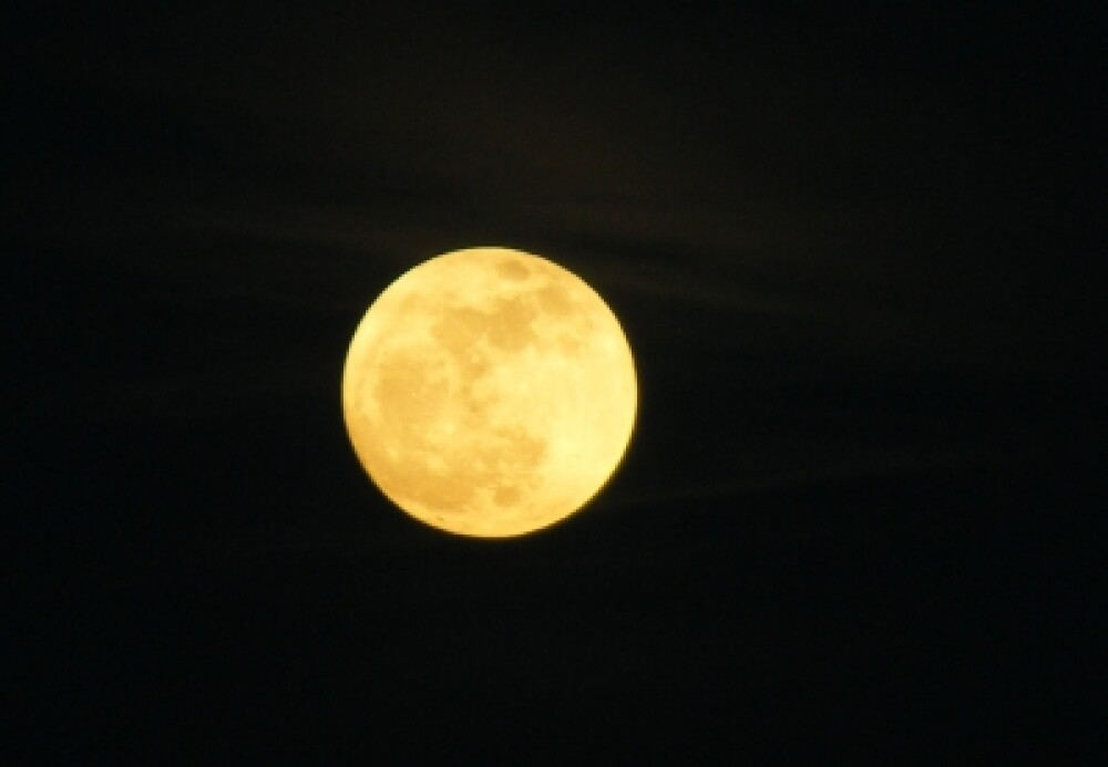 Super-luna in imagini. Cele mai spectaculoase fotografii realizate in momentul de apropiere maxima - Imaginea 3