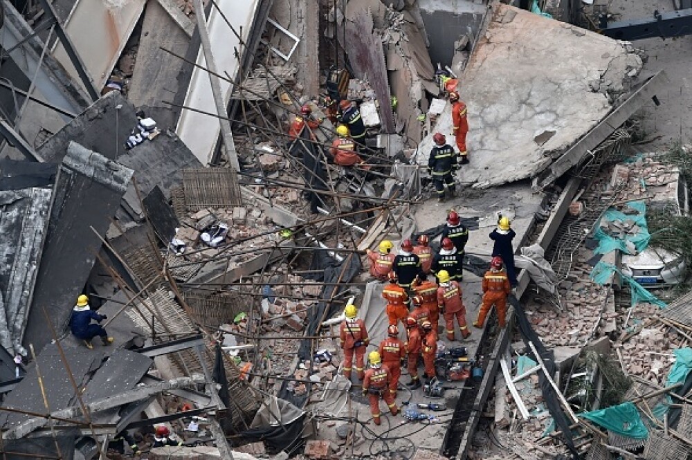 5 morți și 14 răniți, după ce o clădire s-a prăbușit la Shanghai. VIDEO, FOTO - Imaginea 6