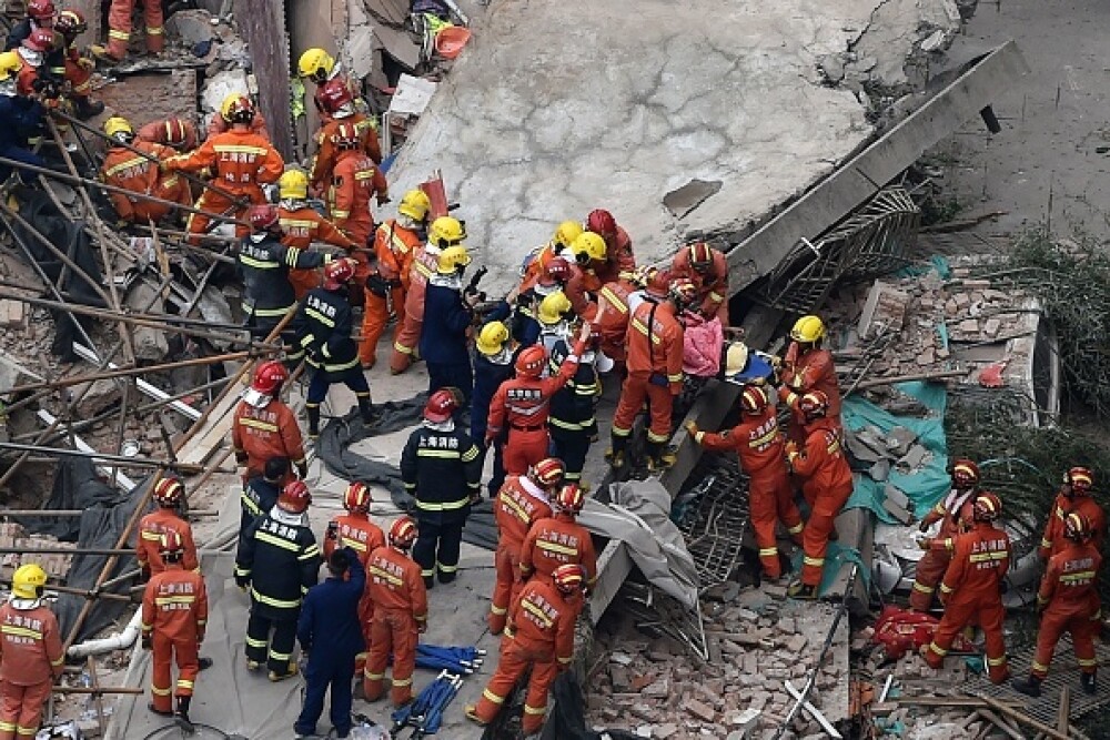 5 morți și 14 răniți, după ce o clădire s-a prăbușit la Shanghai. VIDEO, FOTO - Imaginea 5